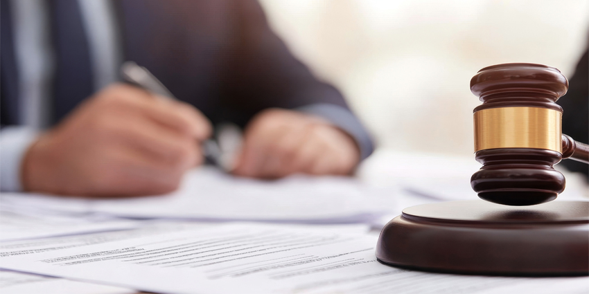 Legal documents and a judge's gavel